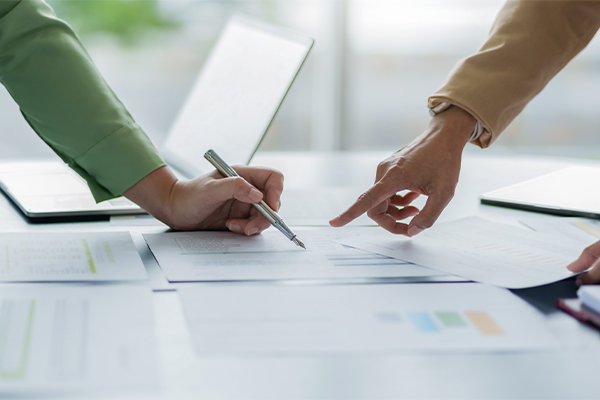 Business-investor-analyzing-a-valuation-data-forecast-a-investment-project.